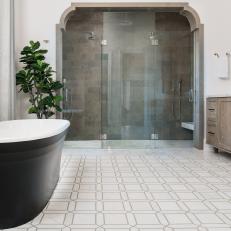 Mediterranean Spa Bathroom With Black Bathtub