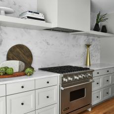 Contemporary Kitchen Features a Stunning Marble Backsplash 