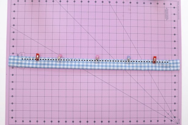 Sew between the two pins, leaving 1.5” unsewn on each end.