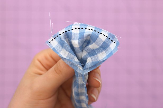 Sew the short seam together. Then reach through the remaining opening and finish turning the tube inside out. You should end up with a large circle.