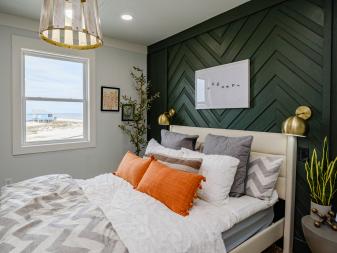As seen on HGTV’s Battle on the Beach, the Main Bedroom of the beach house after the team mentored by Taniya Navak redesigned it as a part of the design challenge. (After, Corner 3)