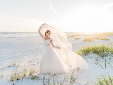 Beach Wedding Bride With Veil Blowing in the Wind
