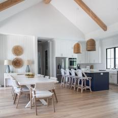 Coastal Dining Area and Kitchen With Woven Pendants