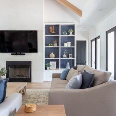 Coastal Living Room With Blue Shiplap Shelf