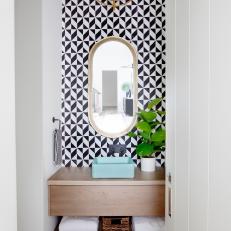 Contemporary Powder Room With Black and White Geometric Wallpaper and Floating Vanity