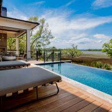 Contemporary Teak Pool Deck With Infinity Edge and Scenic Views 
