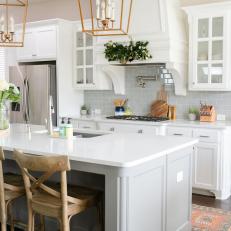 Timeless and Transitional Kitchen Features Stunning Gold Pendant Lights