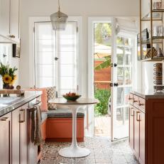 Multicolored Galley Kitchen With Peach Banquette