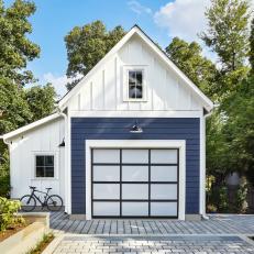Blue and White Garage Exterior and Bike