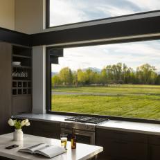 Kitchen With Low-Profile Cabinets and Expansive Views