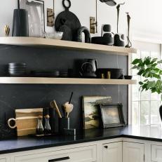 Black and White Kitchen With Black Marble