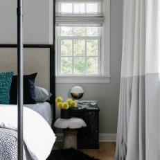 Contemporary Bedroom With Black Sheepskin