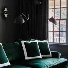 Black Living Room With Green Sofa
