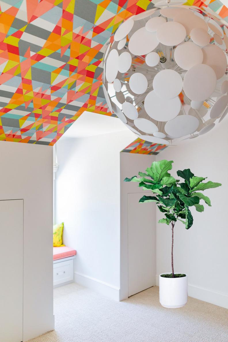 Geometric Colorful Ceiling in Room with Globed, White Modern Pendant