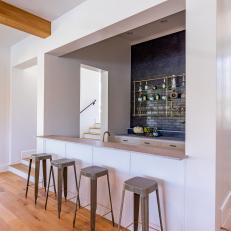 Contemporary Home Bar with Exposed Beams
