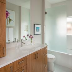 Neutral Transitional Bathroom With Flower Art
