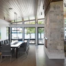 Contemporary Dining Room With Sloped Ceiling