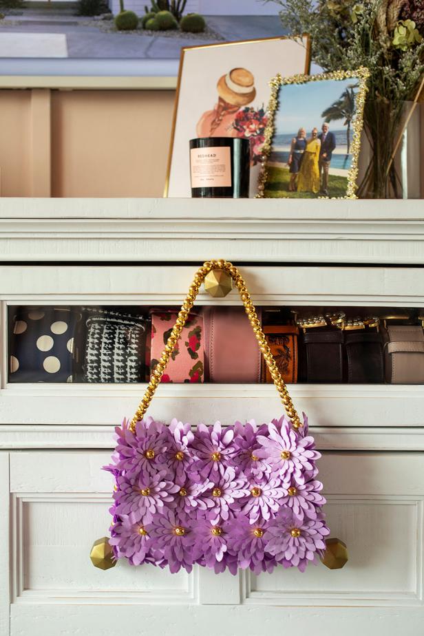 Wood Dresser With Flower Purse Hanging on Knob