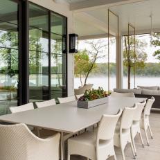 White Contemporary Covered Patio With Dining Table and Sofa Swings 