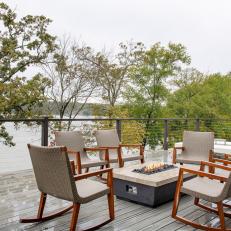 Contemporary Deck With Fire Pit, Neutral Rocking Chairs and River View 
