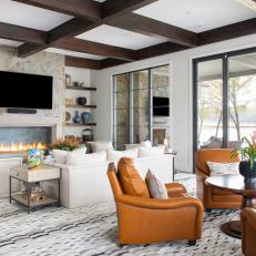 Transitional Waterfront Great Room With Exposed Beam Ceiling and Natural Stone Hearth