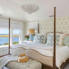 Traditional Coastal Bedroom With Vaulted Ceiling and Patterned Wallpaper 