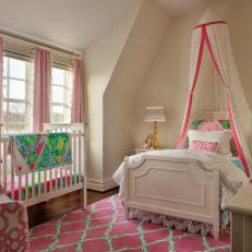 Traditional Bedroom and Nursery With Pink Accents 