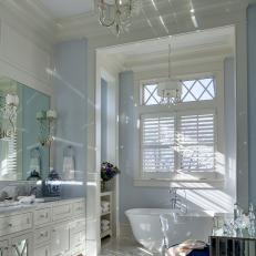 Blue and White Traditional Bath Suite With Chandelier and Soaking Tub 