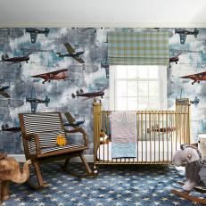 Eclectic Nursery With Graphic Wallpaper