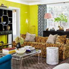 Maximalist Living Room With Acid Green Walls and Tiger Print Sofa