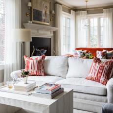 Traditional Neutral Living Room With Red Pillows
