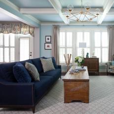 Blue Transitional Family Room With Navy Sofa