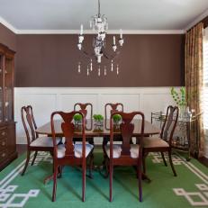 Brown Traditional Dining Room With Green Rug