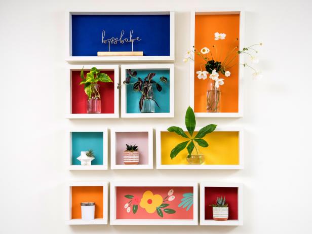 These shadow box frames look amazing. A simple way to liven up this otherwise plain white wall.