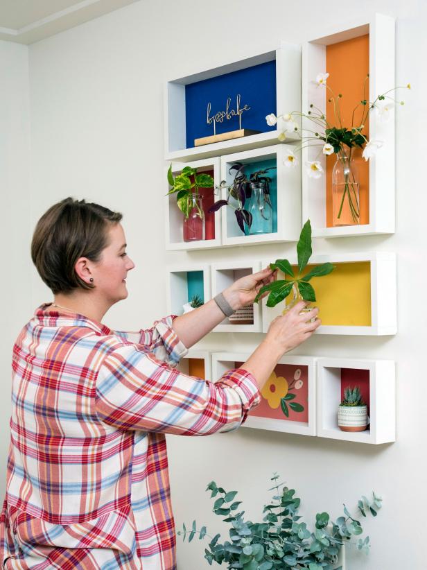 Once your shadow boxes are stuck to the wall you can decorate them with anything you like.. These are a great way to add some color and really make for a wonderful accent piece.