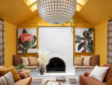 The HGTV Urban Oasis 2021 living room bends the rules with an explosion of color and a harkening back to brilliant vintage design.