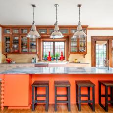 Craftsman Kitchen With Orange Island