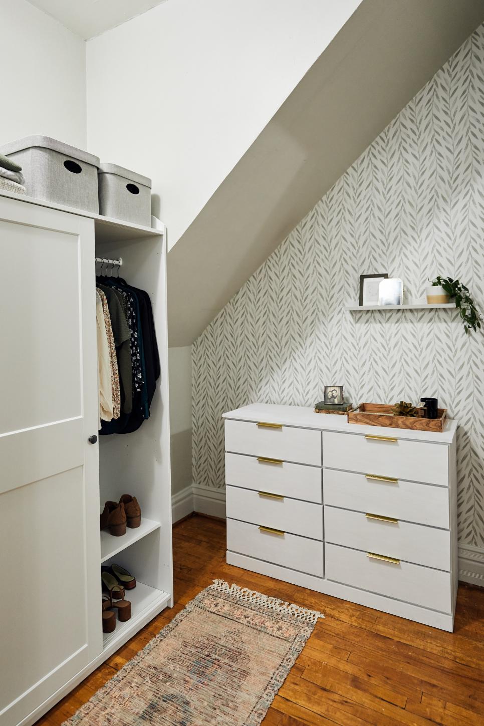 A White Dresser With Brass Hardware and PeelandStick Wallpaper on an