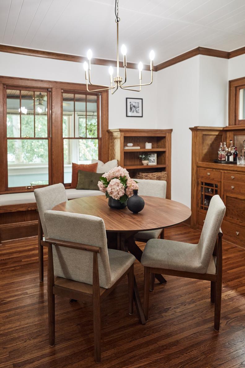 This Craftsman home in Minneapolis, complete with a built-in bar, window seat and bookcases didn't jive well with its residents' coastal-style furniture.