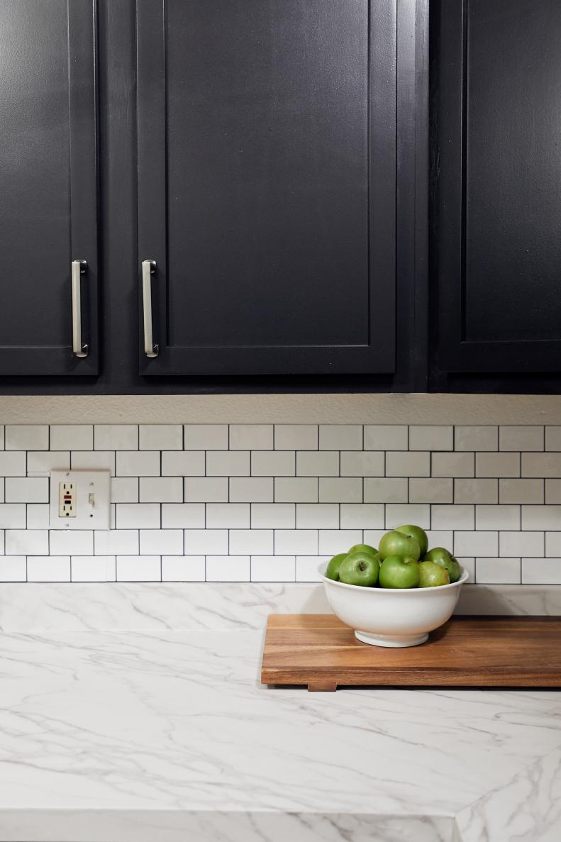 Peel and stick countertop and backsplash coverings freshen up a kitchen and are easy to change out later, if desired.
