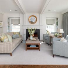 Transitional Neutral Living Room With Porthole Mirror