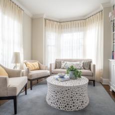 Neutral Transitional Library With Sheer Curtains