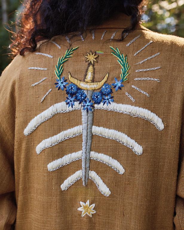 Back of Jacket Embroidered With Large Sword and Flower Crown, Stars