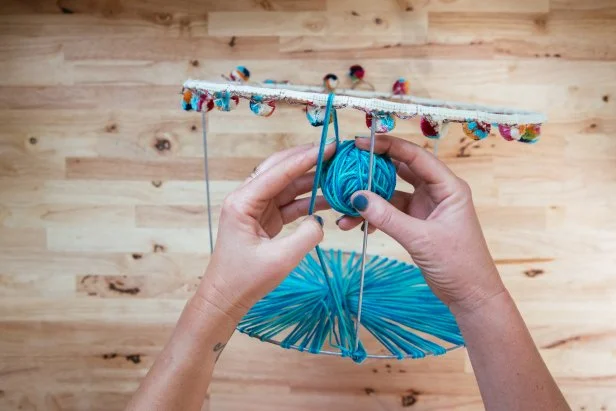 Turn an Old Tomato Cage Into a Fabric Storage Basket | HGTV