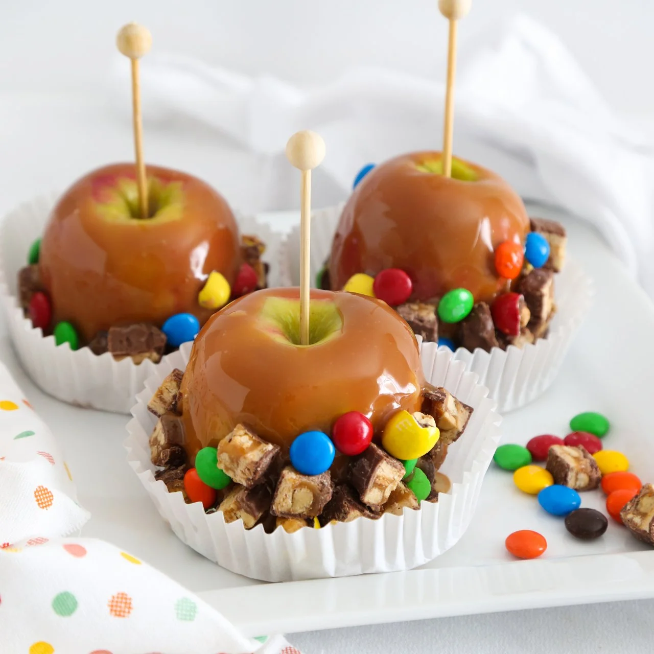How to Make Caramel Apples Dipped in Halloween Candy | HGTV