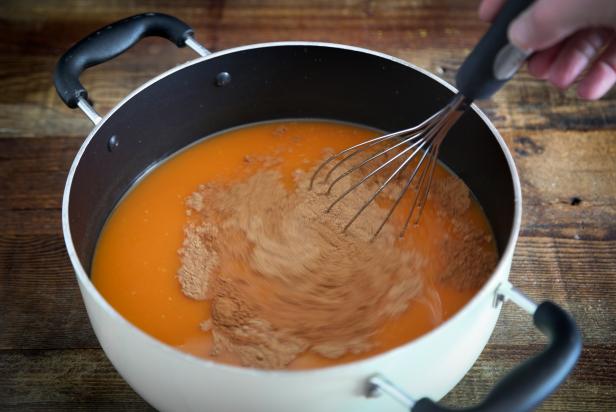 Whisking Spices Into Pumpkin Puree and Apple Cider Mixture