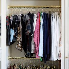 Well-Organized Closet With Hanging Clothes