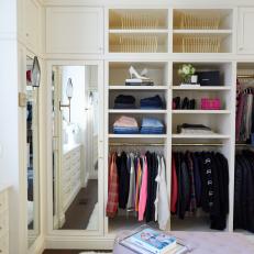 Walk In Closet With Gold Baskets