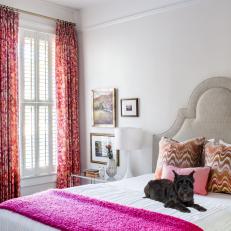 Pink and White Main Bedroom With Dog