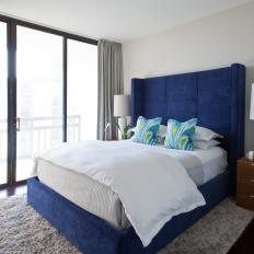 Midcentury Modern Bedroom With Blue Bed